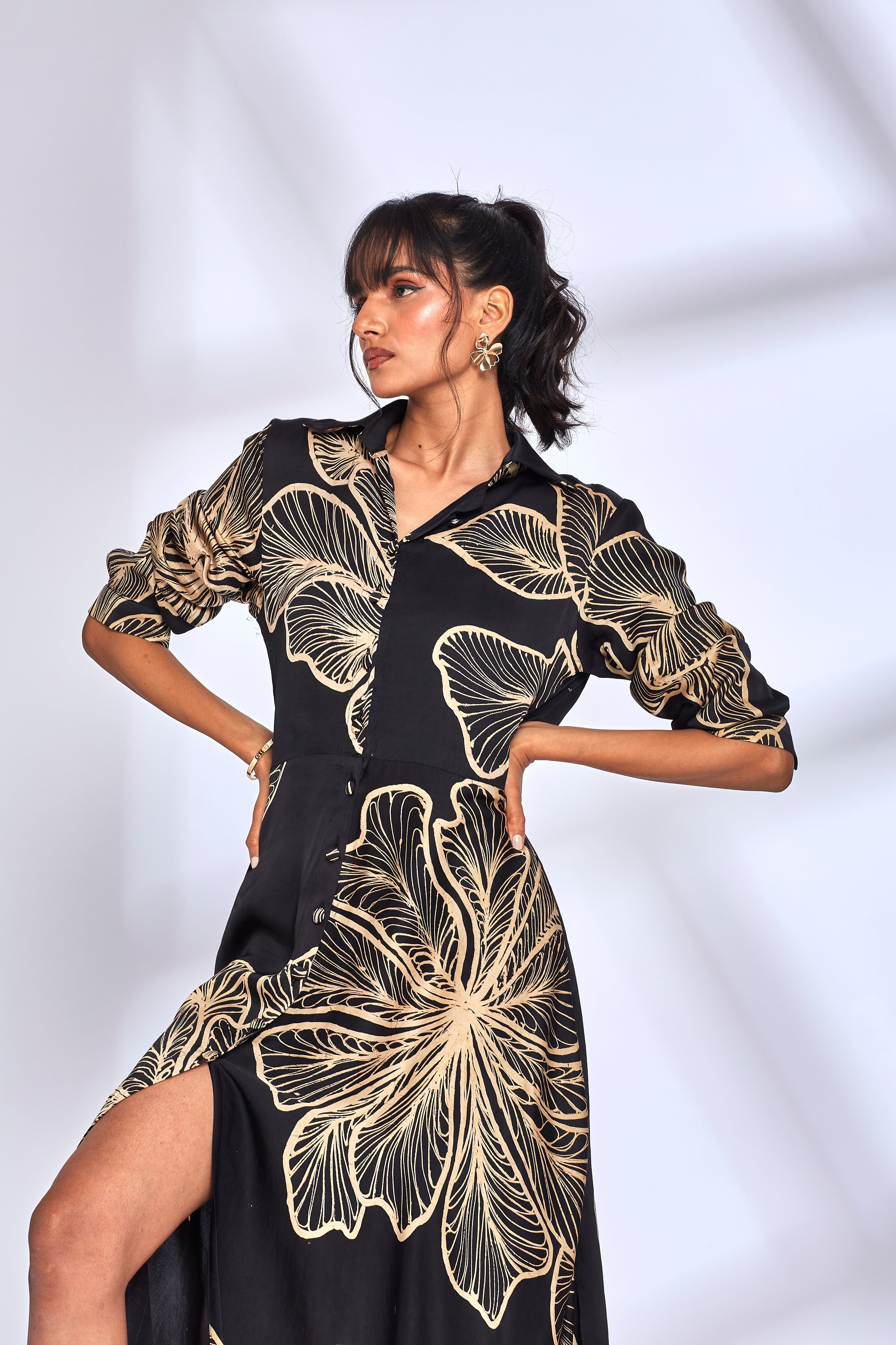 Black Printed Long Shirt Dress at Kamakhyaa by Hasttvam. This item is Black, Floral, Fusion Wear, Handmade by Artisans, Modal silk, Natural dyes, Printed, Respondible production and Vegan