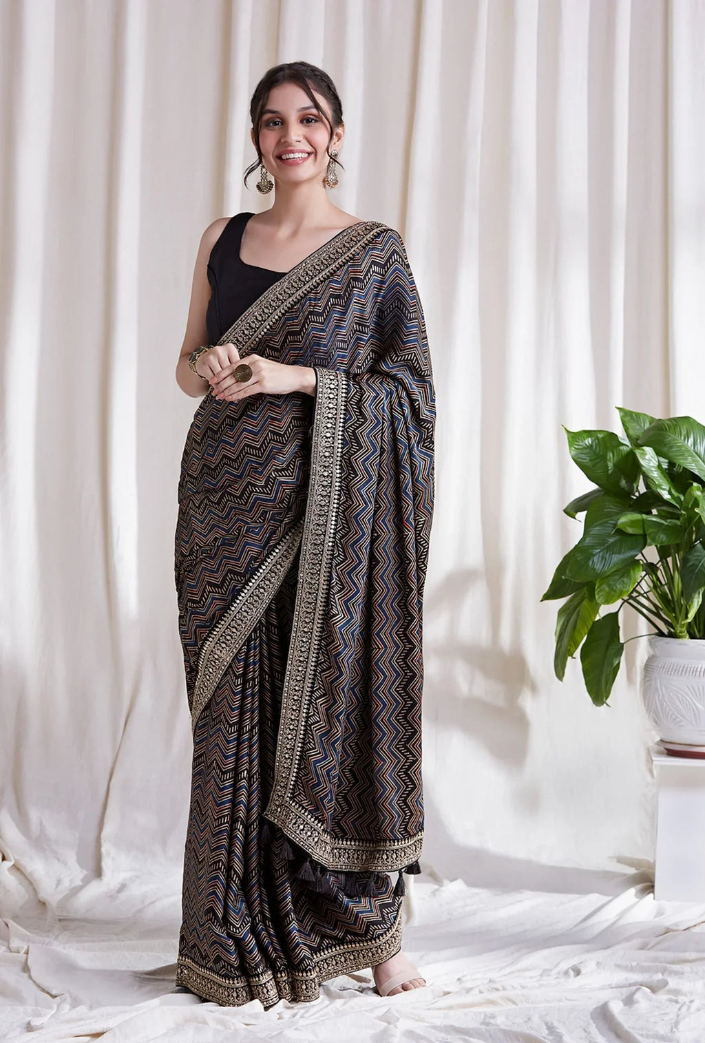Black Printed Saree with Blouse at Kamakhyaa by Hasttvam. This item is Black, Festive Wear, Floral, Modal silk, Natural dyes, Relaxed Fit, Respondible production and Vegan