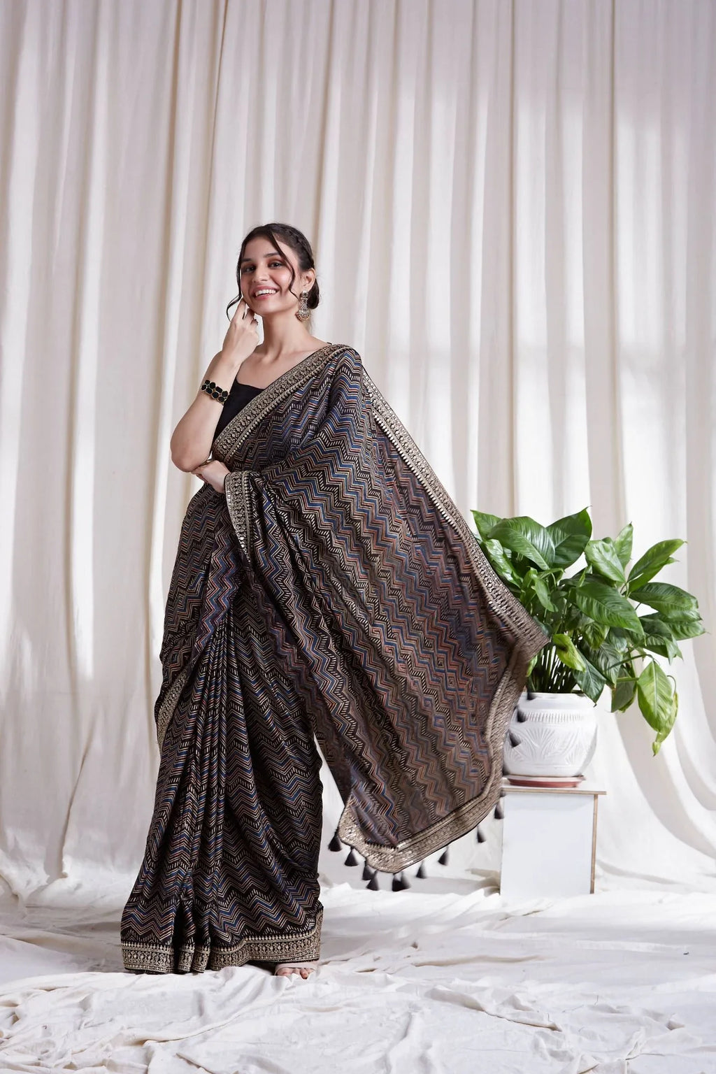 Black Printed Saree with Blouse at Kamakhyaa by Hasttvam. This item is Black, Festive Wear, Floral, Modal silk, Natural dyes, Relaxed Fit, Respondible production and Vegan
