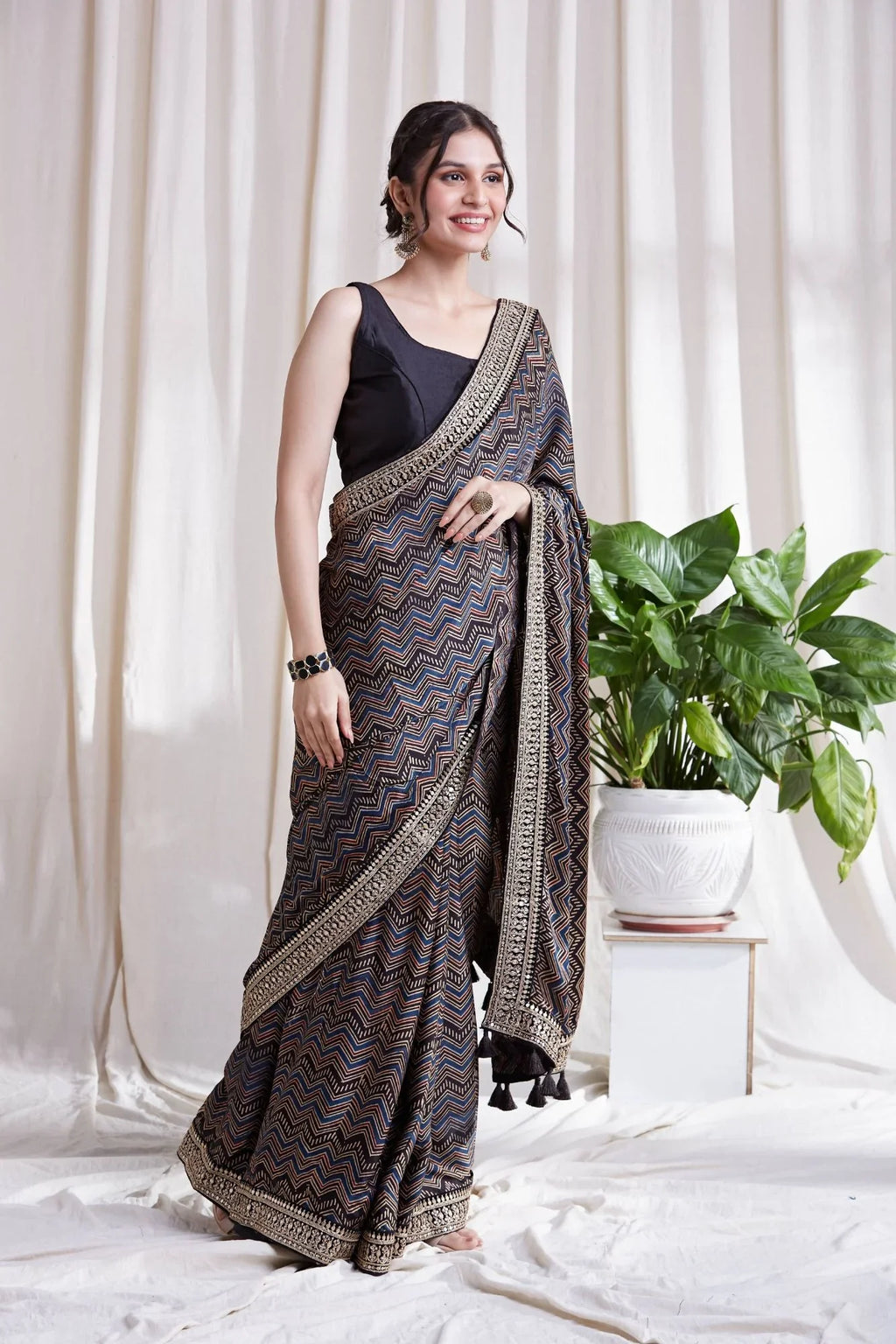 Black Printed Saree with Blouse at Kamakhyaa by Hasttvam. This item is Black, Festive Wear, Floral, Modal silk, Natural dyes, Relaxed Fit, Respondible production and Vegan