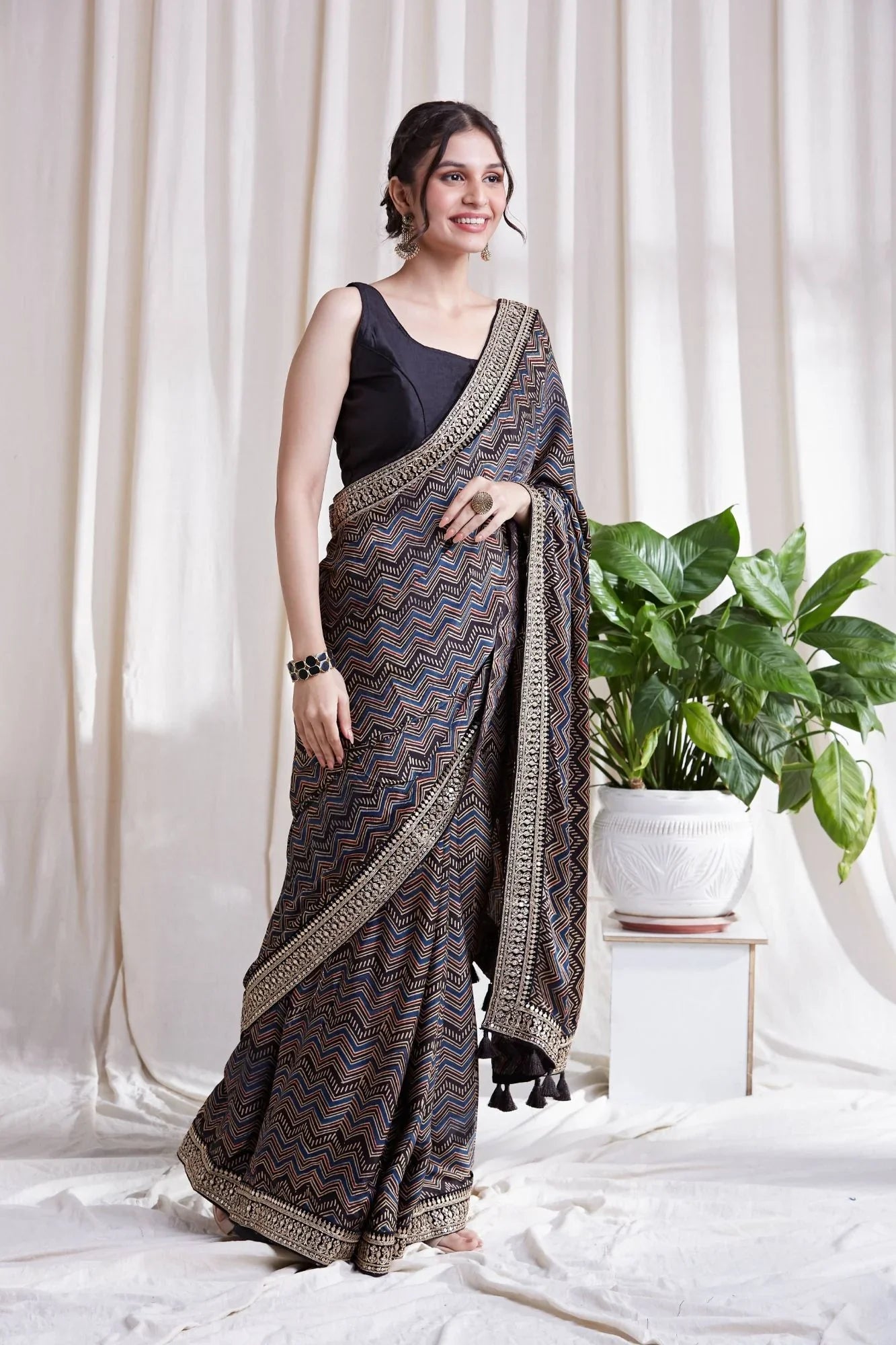 Black Printed Saree with Blouse at Kamakhyaa by Hasttvam. This item is Black, Festive Wear, Floral, Modal silk, Natural dyes, Relaxed Fit, Respondible production and Vegan
