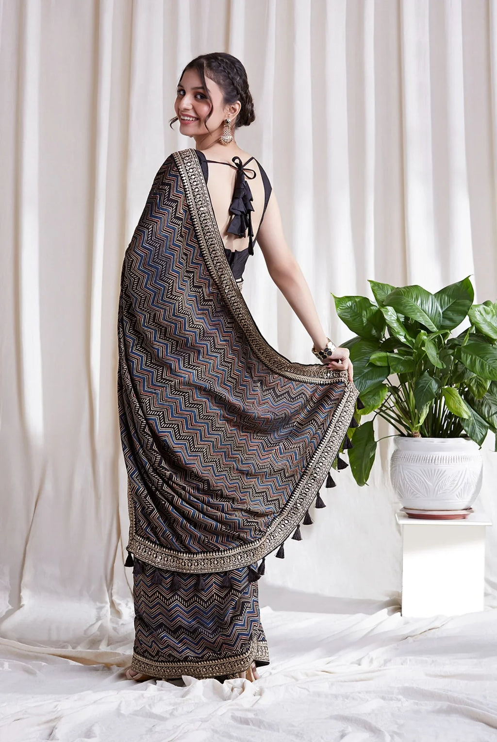 Black Printed Saree with Blouse at Kamakhyaa by Hasttvam. This item is Black, Festive Wear, Floral, Modal silk, Natural dyes, Relaxed Fit, Respondible production and Vegan