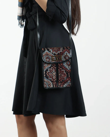 Black Resort Wear Sling Bag at Kamakhyaa by The Indian Trunk. This item is Artisan Made, Batik Prints, Black, Free Size, leather, Modal SIlk, Resort Wear, Sling Bags