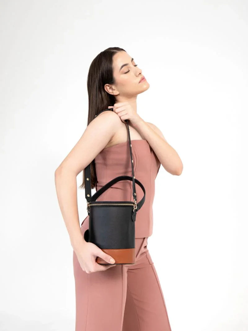 Black Solid Bucket Bag at Kamakhyaa by Green Hermitage. This item is Apple Leather, Black, Bucket Bags, Casual Wear, Free Size, Hemp, Lyocell, Recycled, Solids