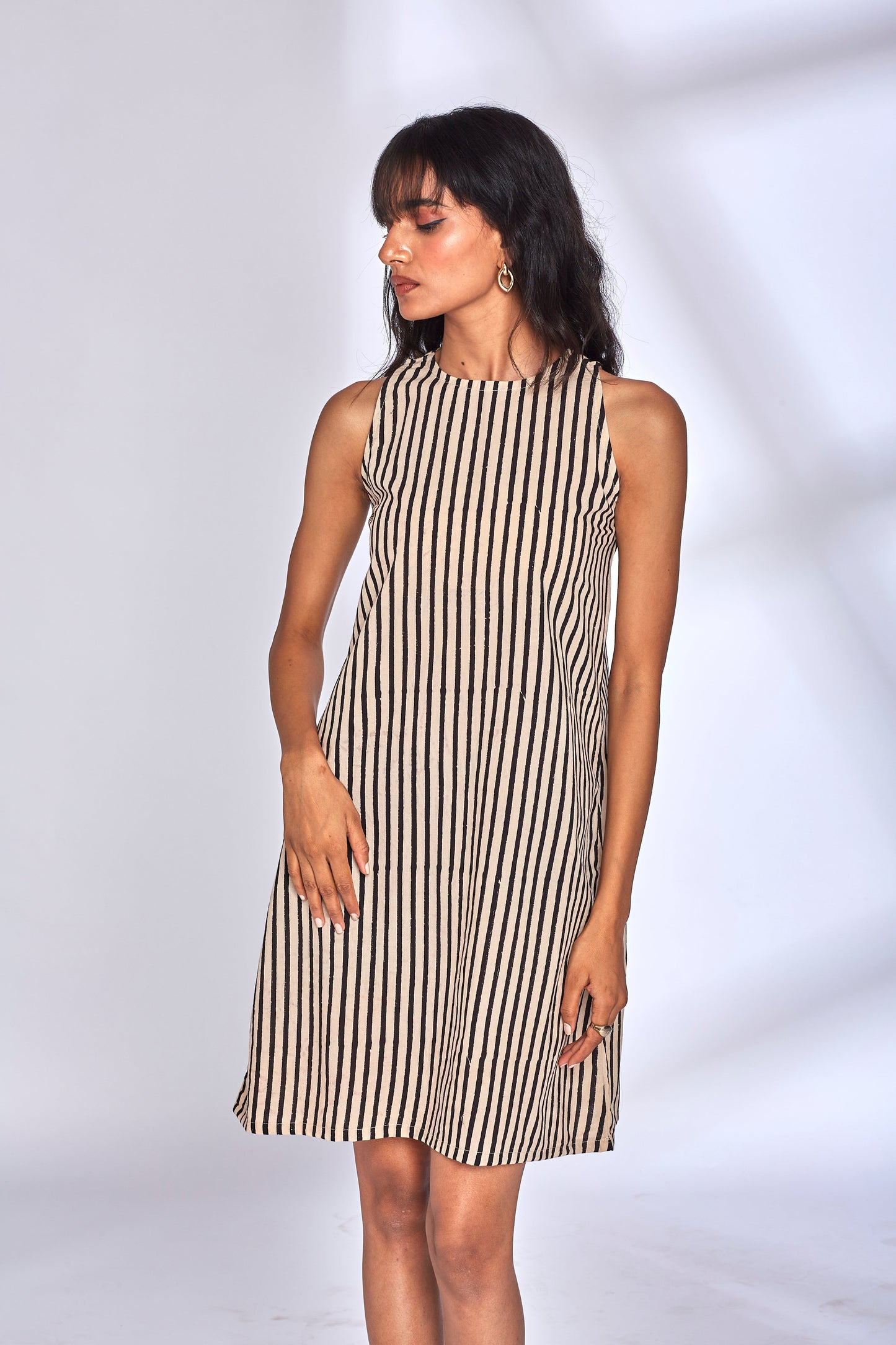 Black Striped Cotton Midi Dress at Kamakhyaa by Hasttvam. This item is CottonStripesFusionWhiteHandmade by artisans, Natural dyes, Relaxed Fit, Respondible production and Vegan