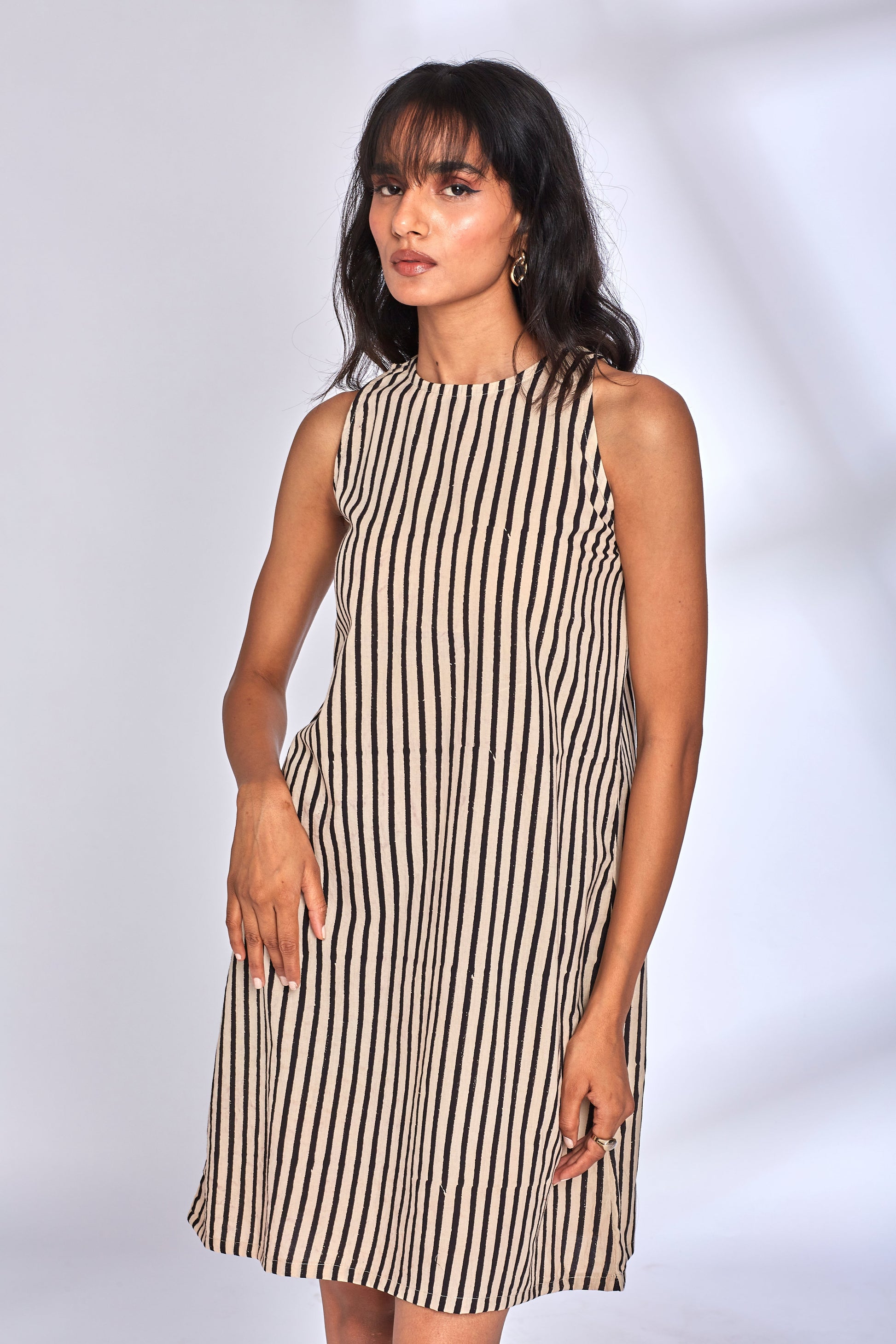 Black Striped Cotton Midi Dress at Kamakhyaa by Hasttvam. This item is CottonStripesFusionWhiteHandmade by artisans, Natural dyes, Relaxed Fit, Respondible production and Vegan