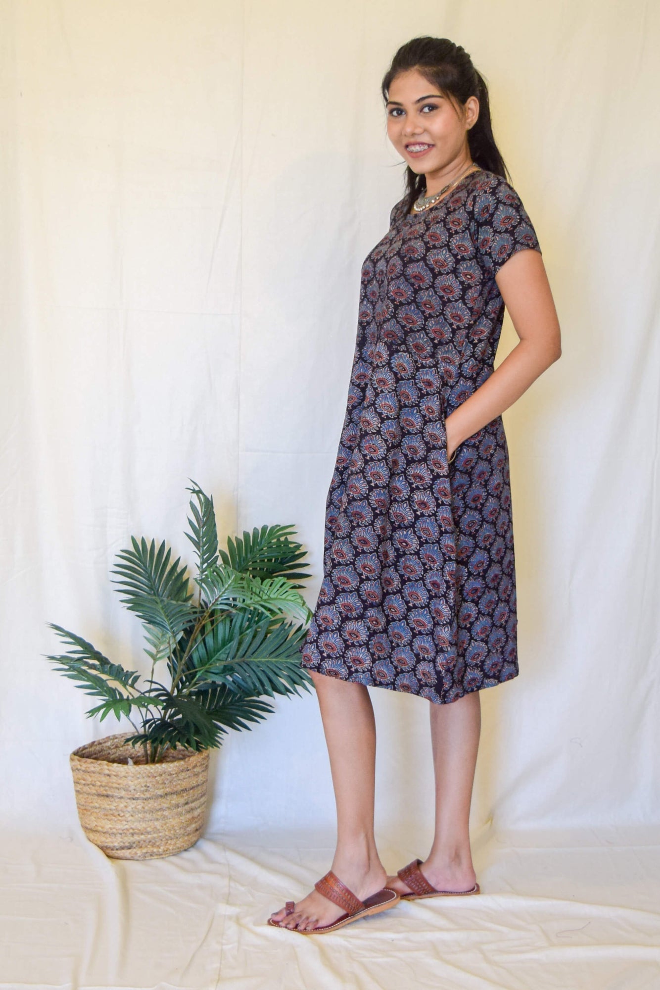 Block Printed Midi Dress at Kamakhyaa by Hasttvam. This item is Black, Casual Wear, Cotton, Floral, Handmade by Artisans, Natural dyes, Relaxed Fit, Respondible production and Vegan