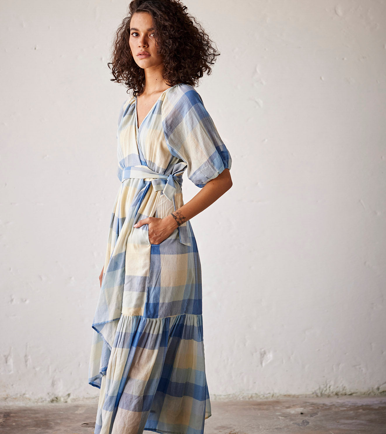 Blue Checks Cotton Knot Wrap Dress at Kamakhyaa by Khara Kapas. This item is An Indian Summer, Blue, Casual Wear, Checks, Dresses, Mulmul cotton, Organic, Relaxed Fit, Womenswear