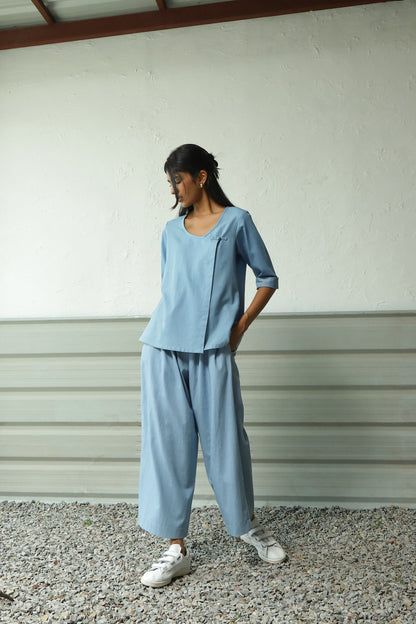 Blue Cotton Overlap Top Pant Set at Kamakhyaa by Canoopi. This item is Black, Blue, Canoopi, Casual Wear, Complete Sets, Cotton, Natural, Poplin, Regular Fit, Solids, Vacation Co-ords, Womenswear