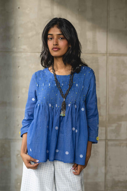 Blue Gathered Pin Tuck Top at Kamakhyaa by Araayeh. This item is Artisan Made, Blue, Casual Wear, Handwoven Cotton Jamdani, Polka Dots, Relaxed Fit, Tunic Tops