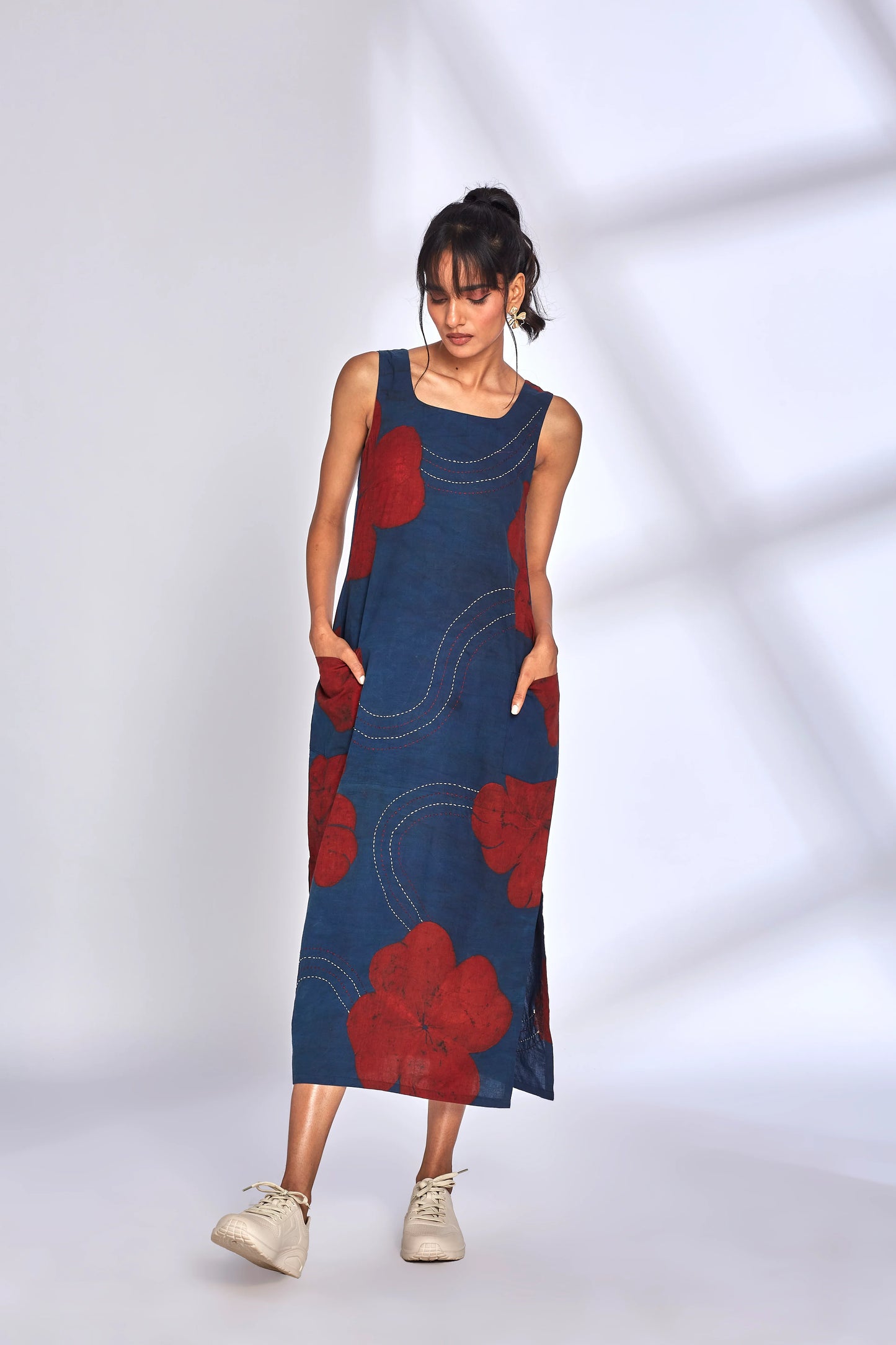 Blue Printed Midi Dress with side slit at Kamakhyaa by Hasttvam. This item is Cotton, Floral, Fusion Wear, Indigo, Natural dyes, Relaxed Fit, Respondible production and Vegan