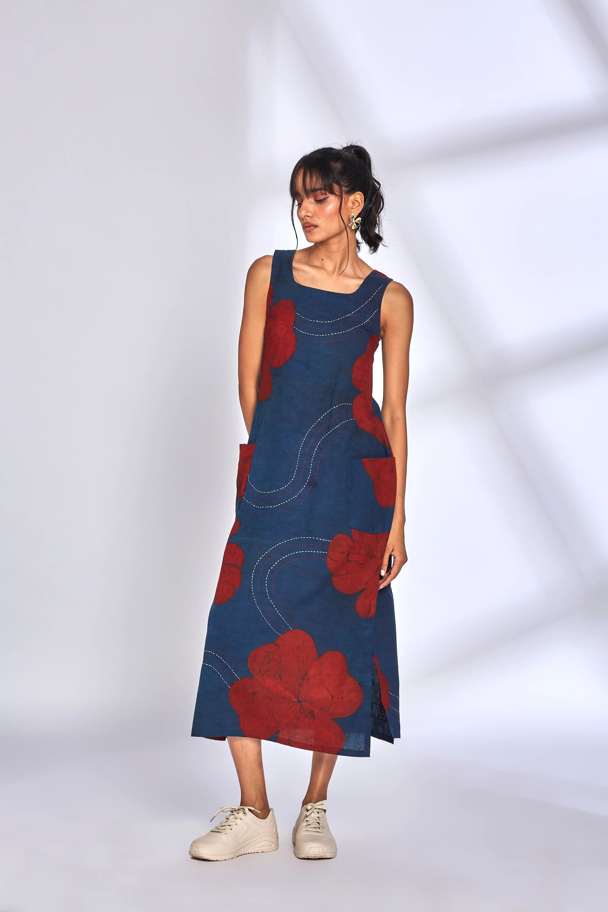 Blue Printed Midi Dress with side slit at Kamakhyaa by Hasttvam. This item is Cotton, Floral, Fusion Wear, Indigo, Natural dyes, Relaxed Fit, Respondible production and Vegan