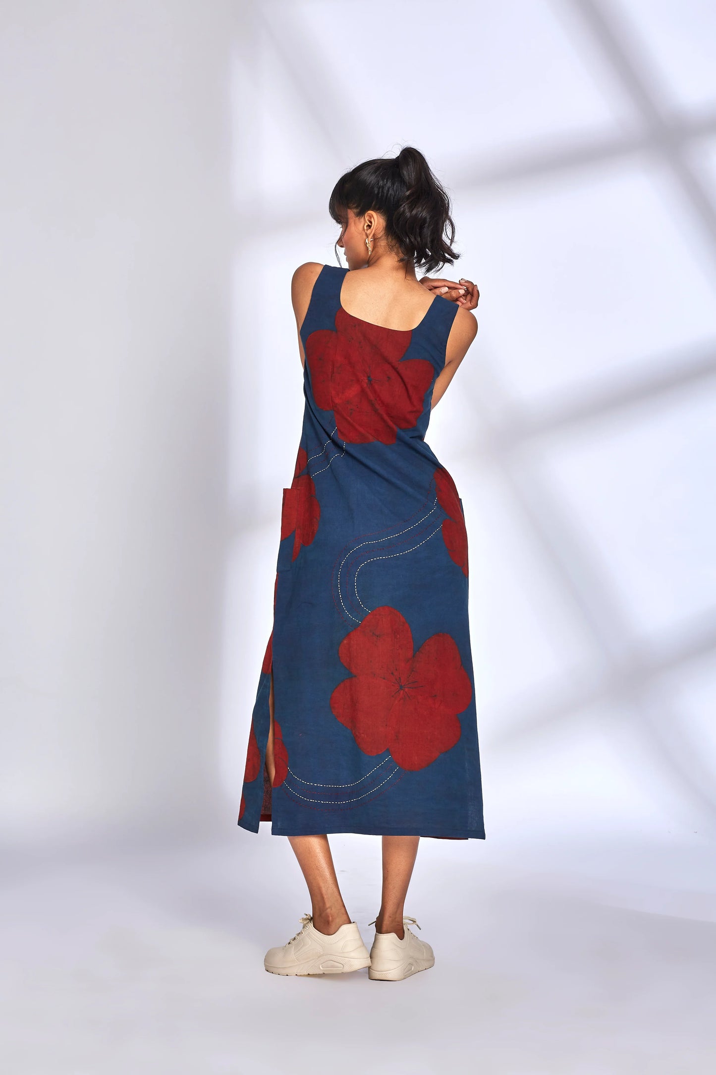 Blue Printed Midi Dress with side slit at Kamakhyaa by Hasttvam. This item is Cotton, Floral, Fusion Wear, Indigo, Natural dyes, Relaxed Fit, Respondible production and Vegan