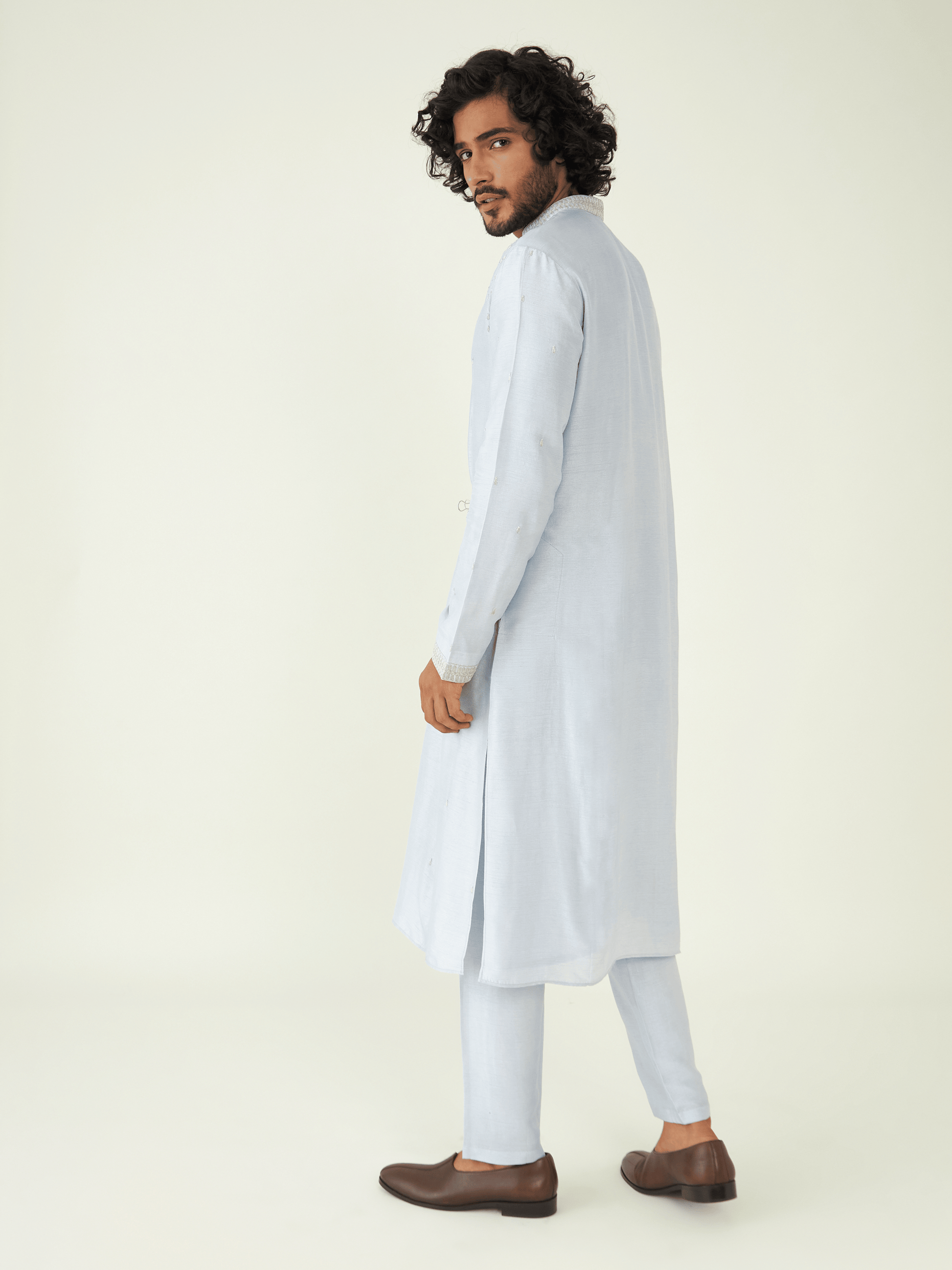 Blue Regular Fit Kurta Set at Kamakhyaa by RoohbyRidhimaa. This item is Blue, Festive Wear, Kurta Pant Sets, Men Kurta Pant Sets, Menswear By RoohbyRidhimaa, Qala By RoohbyRidhimaa, Regular Fit, Solids, Viscose Raw Silk