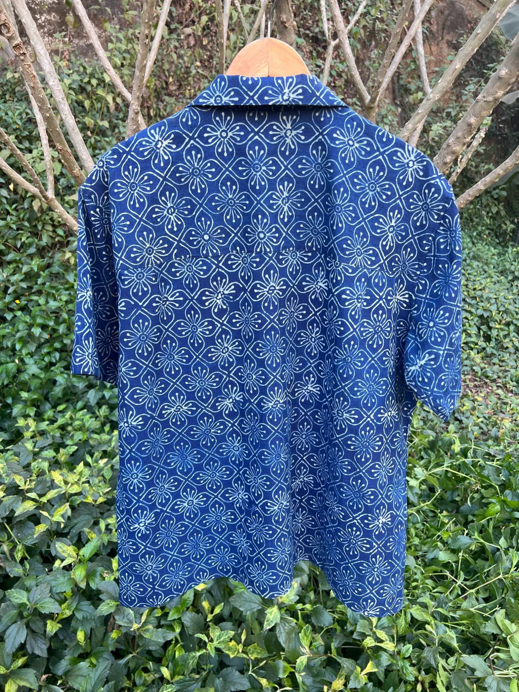 Blue Shirt with Ajrakh print at Kamakhyaa by Hasttvam. This item is Casual Wear, Cotton, Floral, Handmade by Artisans, Indigo, Natural dyes, Relaxed Fit, Respondible production and Vegan