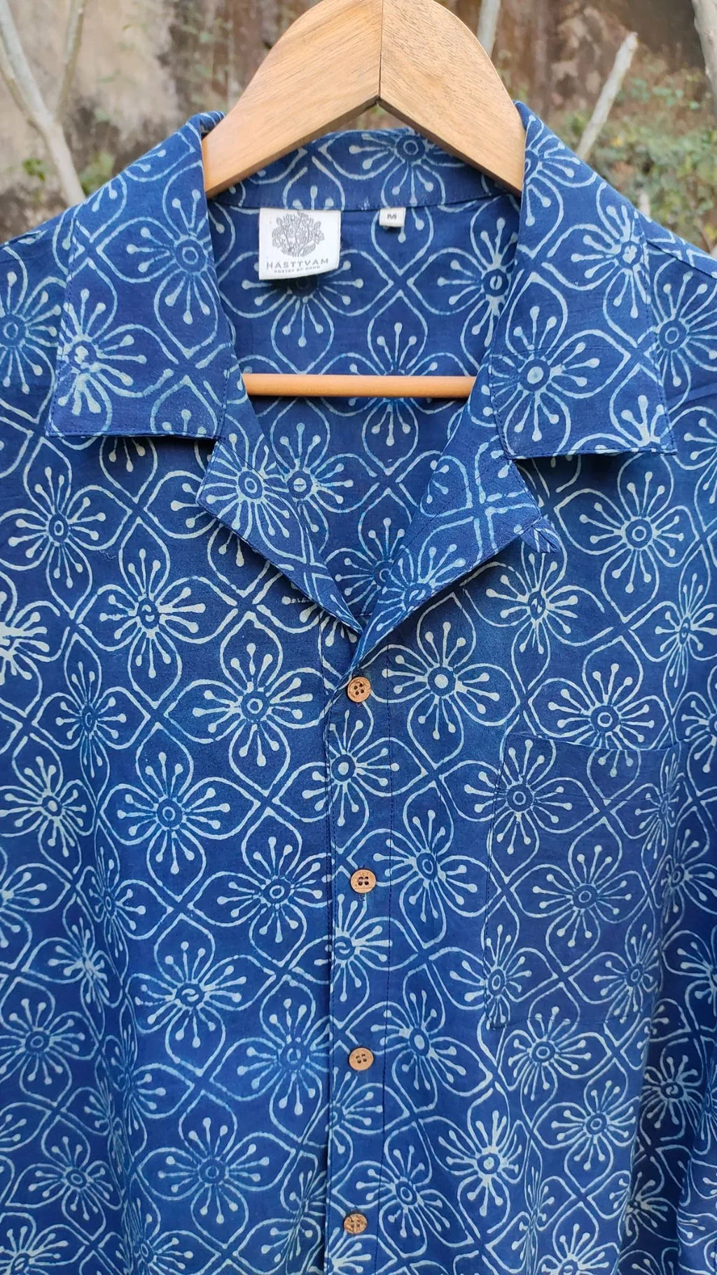 Blue Shirt with Ajrakh print at Kamakhyaa by Hasttvam. This item is Casual Wear, Cotton, Floral, Handmade by Artisans, Indigo, Natural dyes, Relaxed Fit, Respondible production and Vegan