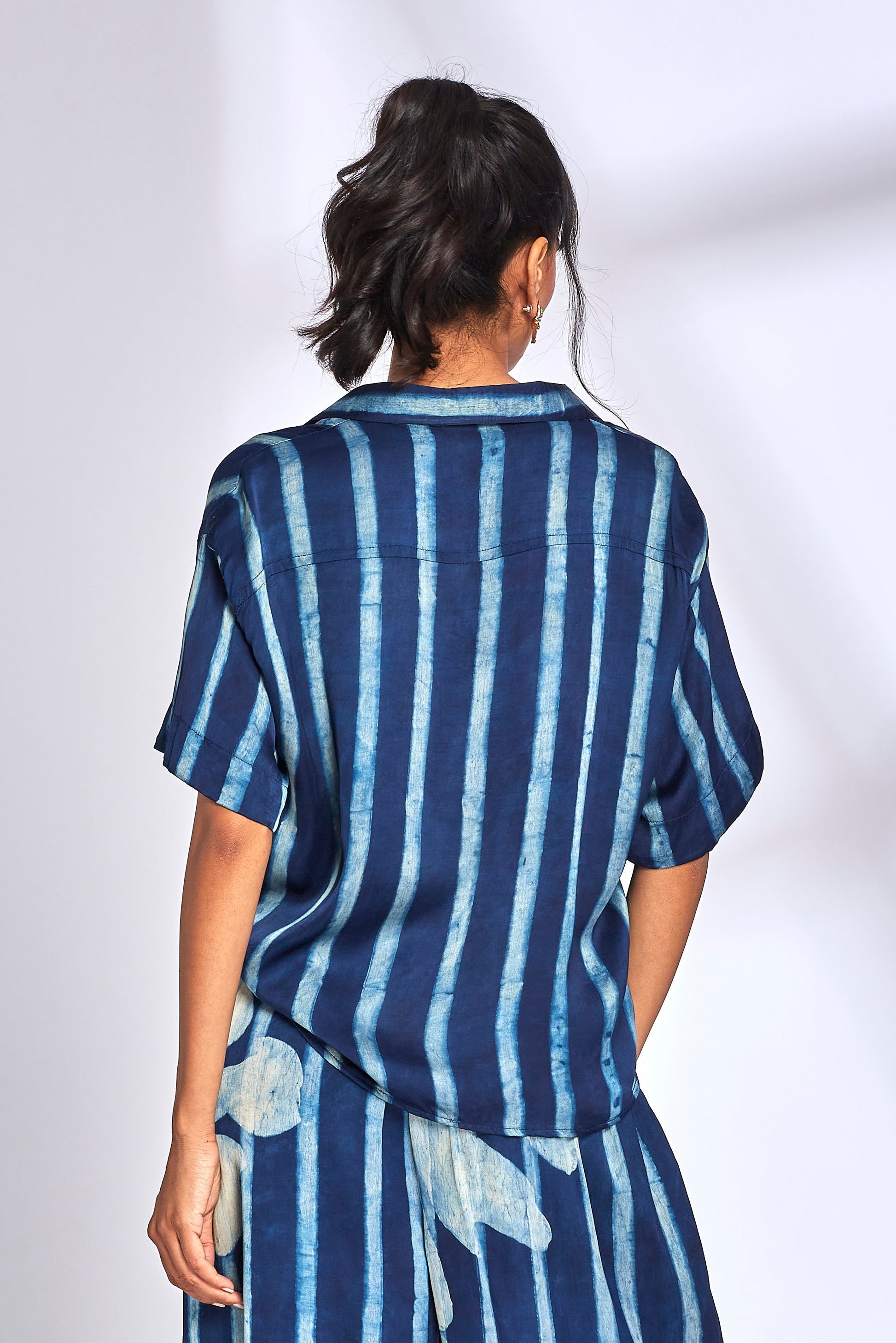 Blue Striped Printed Shirt at Kamakhyaa by Hasttvam. This item is Fusion Wear, ModalFloralFusionIndigoHandmade by artisans, Natural dyes, Relaxed Fit, Respondible production and Vegan