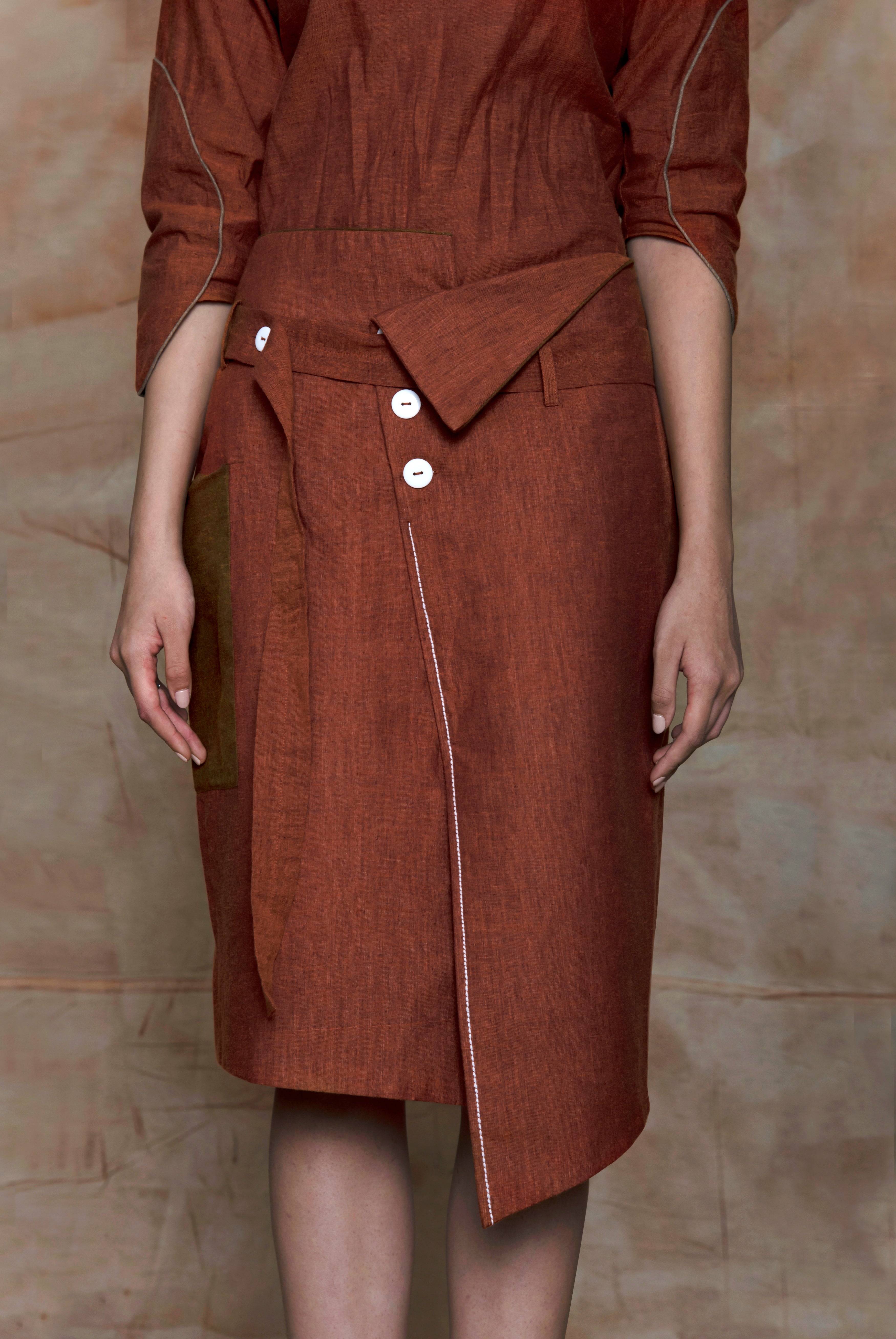 Brown Midi Skirt at kamakhyaa.com by Anushé Pirani. This item is Brown, Cotton, July Sale, Midi Skirt, Mini Skirts, Natural, Ocean of Stories, Ocean of Stories by Anushe Pirani, Office Wear, Regular Fit, Skirts, Solids, Womenswear