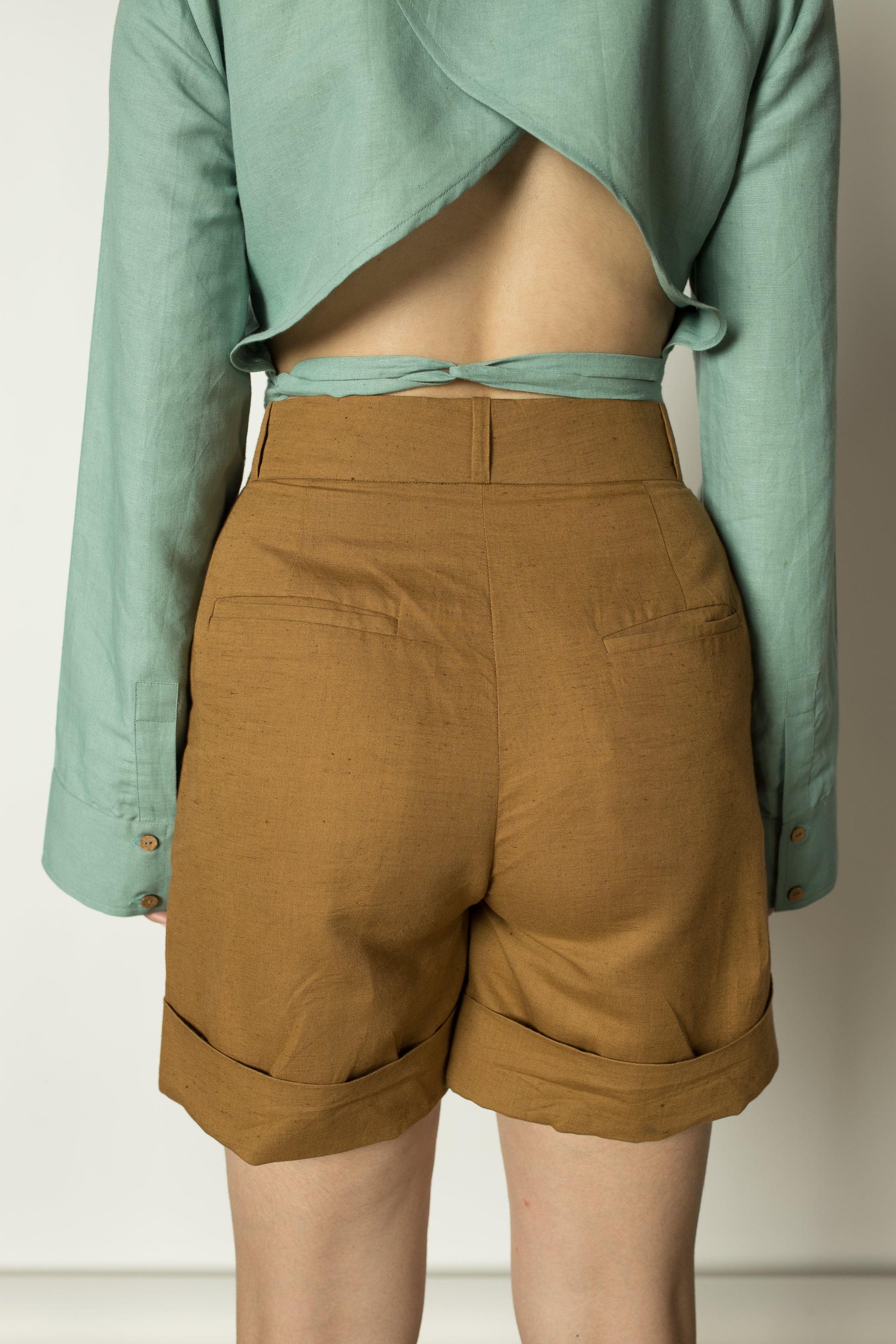 Brown Straight-Leg Shorts at kamakhyaa.com by Anushé Pirani. This item is Brown, Casual Wear, Console Collection List, Cotton, Hemp, Nostalgic Whispers by Anushe Pirani, Regular Fit, Review September 2025, Shorts, Womenswear