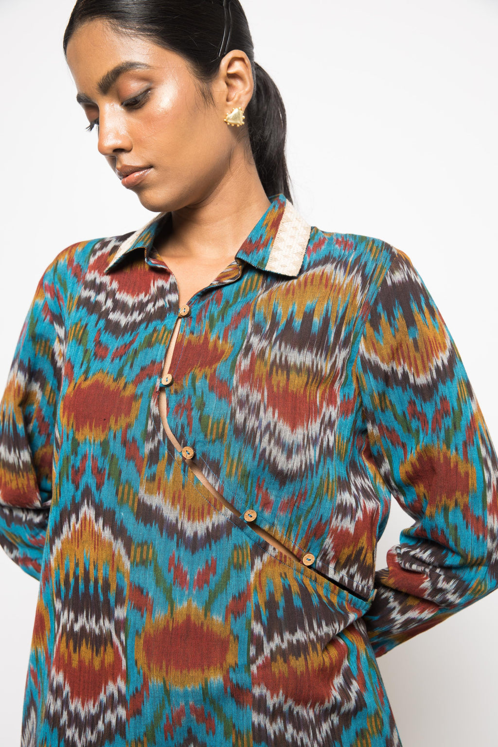 Button-Up Shirt at kamakhyaa.com by Anushé Pirani. This item is 100% Cotton, Beach Wear, Casual Wear, Console Collection List, Cotton, Fresh Ink by Anushe Pirani, Handwoven cotton, Ikat Prints, Regular Fit, Turquoise, Vacation Wear, Womenswear