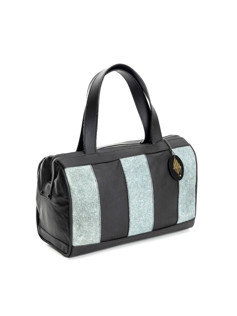 Casual Wear Duffle Bag at Kamakhyaa by Green Hermitage. This item is Apple Leather, Black, Casual Wear, Coconut Leather, Duffle Bags, Free Size, Hemp, Lyocell, Recycled, Striped