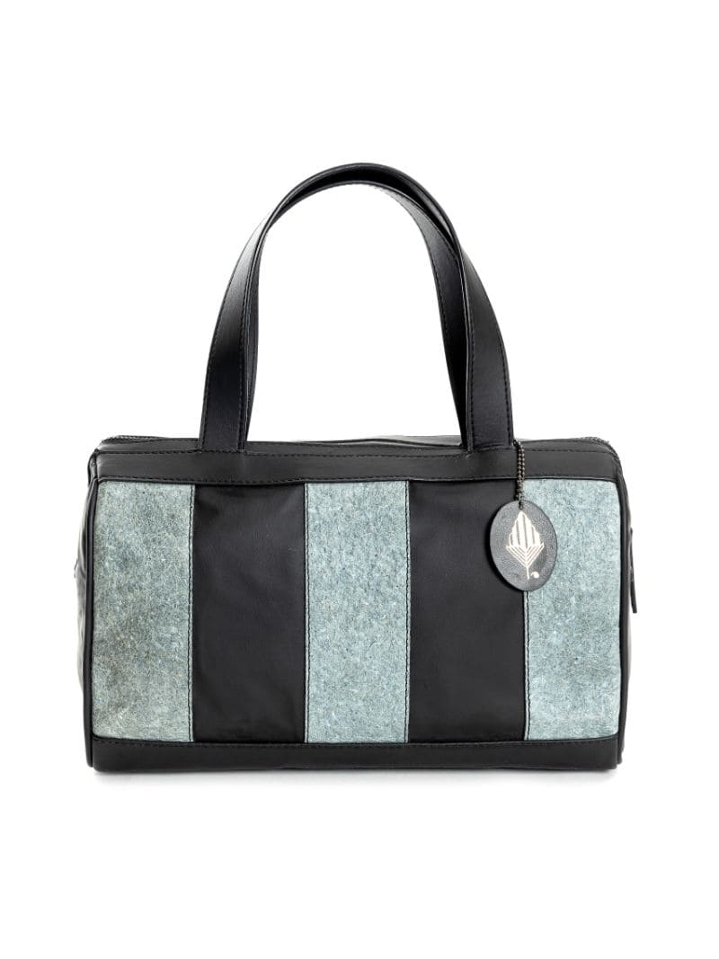 Casual Wear Duffle Bag at Kamakhyaa by Green Hermitage. This item is Apple Leather, Black, Casual Wear, Coconut Leather, Duffle Bags, Free Size, Hemp, Lyocell, Recycled, Striped