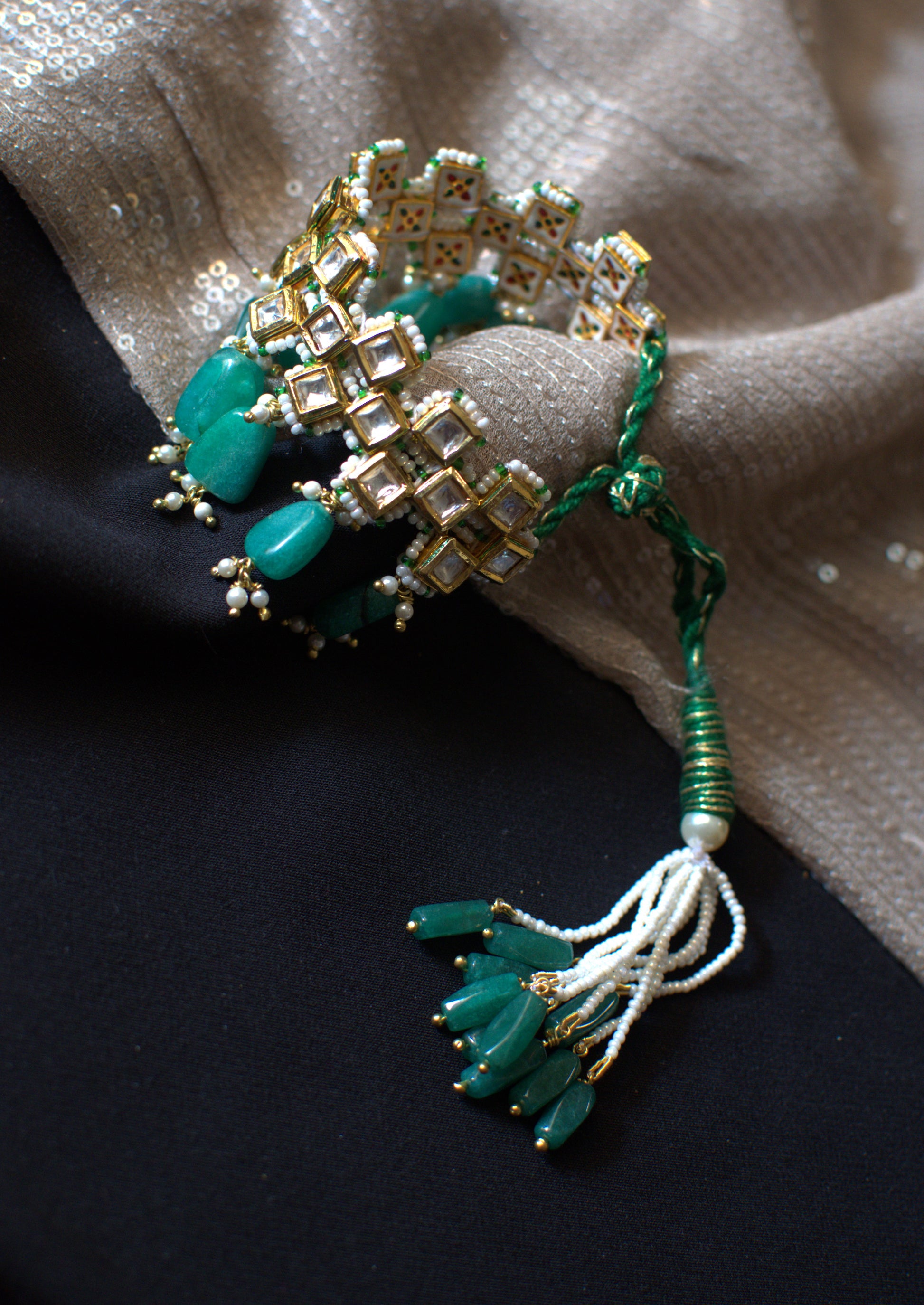 Chauki Haritah Bracelet at Kamakhyaa by House Of Heer. This item is Alloy Metal, Bracelets, Festive Wear, Free Size, Gemstone, jewelry, Multicolor, Natural, Pearl, Polkis, rakhis & lumbas, Textured