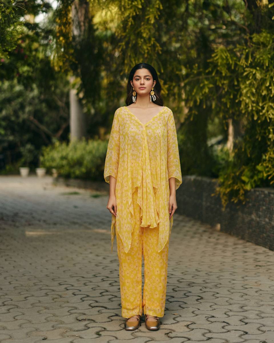 Chiffon Petal Haze Co-ord Set at Kamakhyaa by Ewoke. This item is Chiffon, Nostalgia's Thread by Ewoke, Under $200, yellow coord set, yellow set, yellow top and trouser
