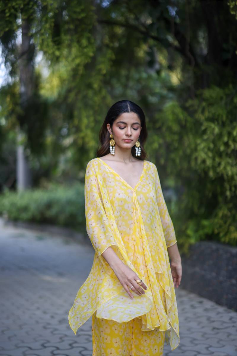 Chiffon Petal Haze Co-ord Set at Kamakhyaa by Ewoke. This item is Chiffon, Nostalgia's Thread by Ewoke, Under $200, yellow coord set, yellow set, yellow top and trouser