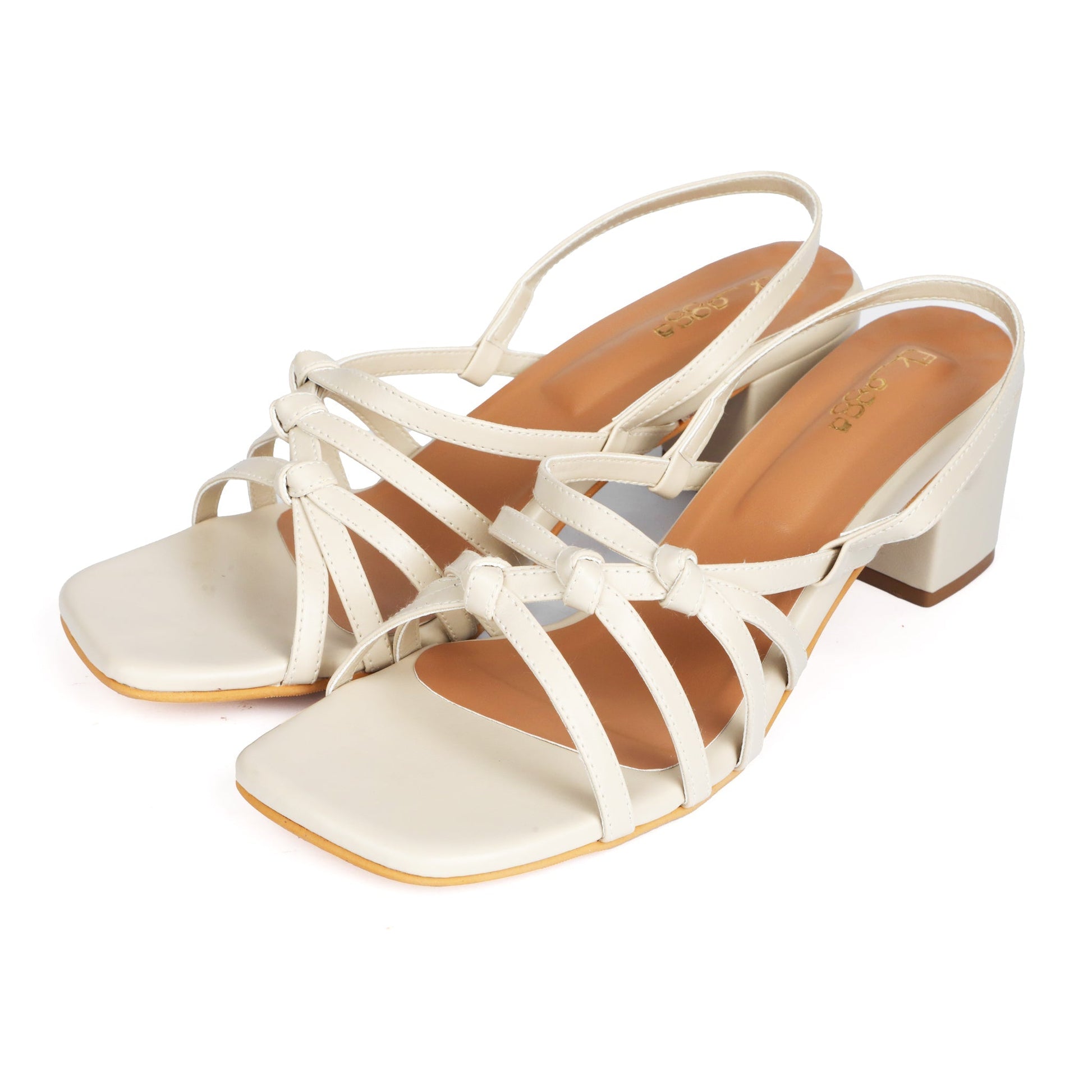 Cream Knot Heels at Kamakhyaa by EK_agga. This item is heels, stylish