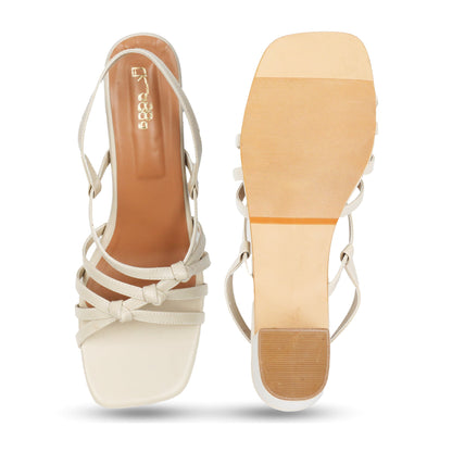 Cream Knot Heels at Kamakhyaa by EK_agga. This item is heels, stylish