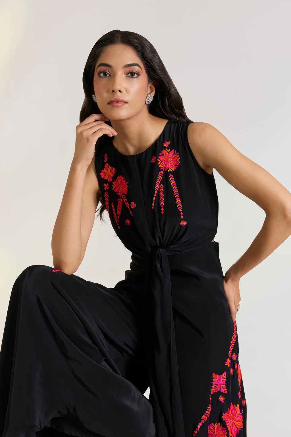 Crepe Black Embroidered Kaia Jumpsuit at Kamakhyaa by Ewoke. This item is Black, black jumpsuit, black outfit, Crepe, embroided pink dress, Holiday wear, Missing image, Nostalgia's Thread by Ewoke, phulkari embroidery, sustainable fashion