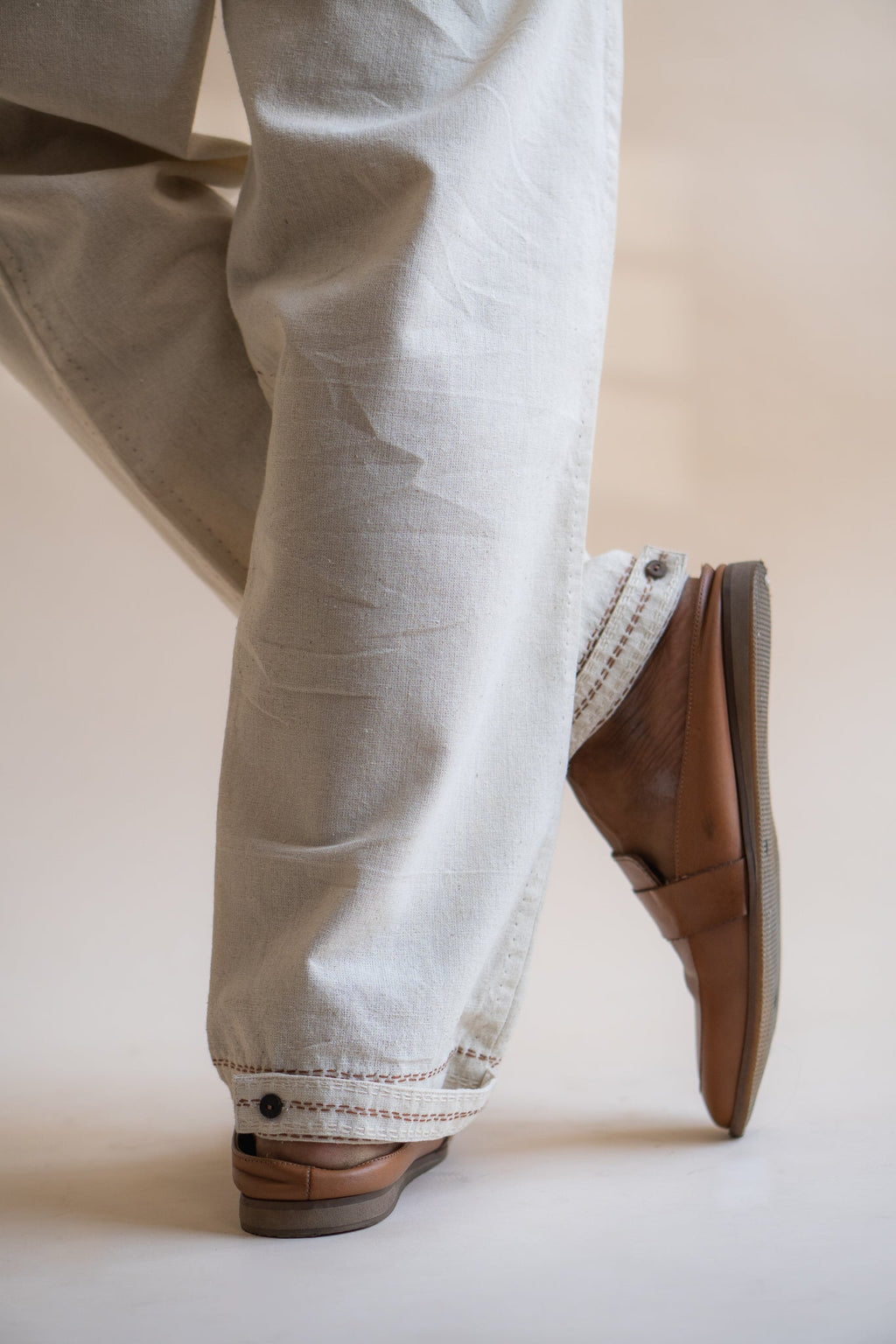 Dawning Pleated Pants at kamakhyaa.com by Lafaani. This item is 100% Cotton, Beige, Casual Wear, Clothing by Lafaani, Dawning by Lafaani, Denim, Embroidered, For Father, For Him, Handwoven Cotton, Kora, Men Shirts, Menswear, Natural, Rakhi Special, Regular Fit, Shirts, Tops, Under $200
