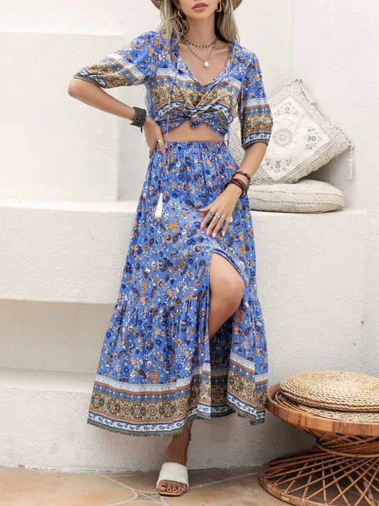 Ditsy Floral Tie Neck Top and Slit Skirt Set at Kamakhyaa by Trendsi. This item is H.R.Z, Ship From Overseas, Trendsi