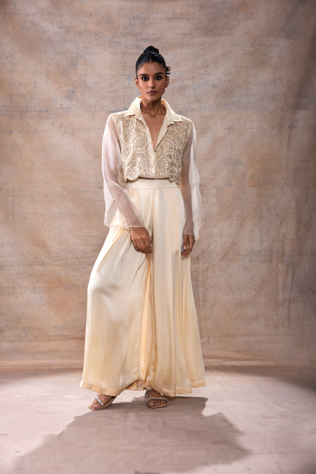 Emboridered Crop Shirt with Flared Pant Set at Kamakhyaa by Akashi Clothing. This item is Co-ord Sets, Evening Wear, Festive Wear, Hand Embroidered, missing, Modal Satin, Off-white, Organza, Party Wear, Party Wear Co-ord Sets, Relaxed Fit, White, Womenswear, Zaira by Akashi Clothing