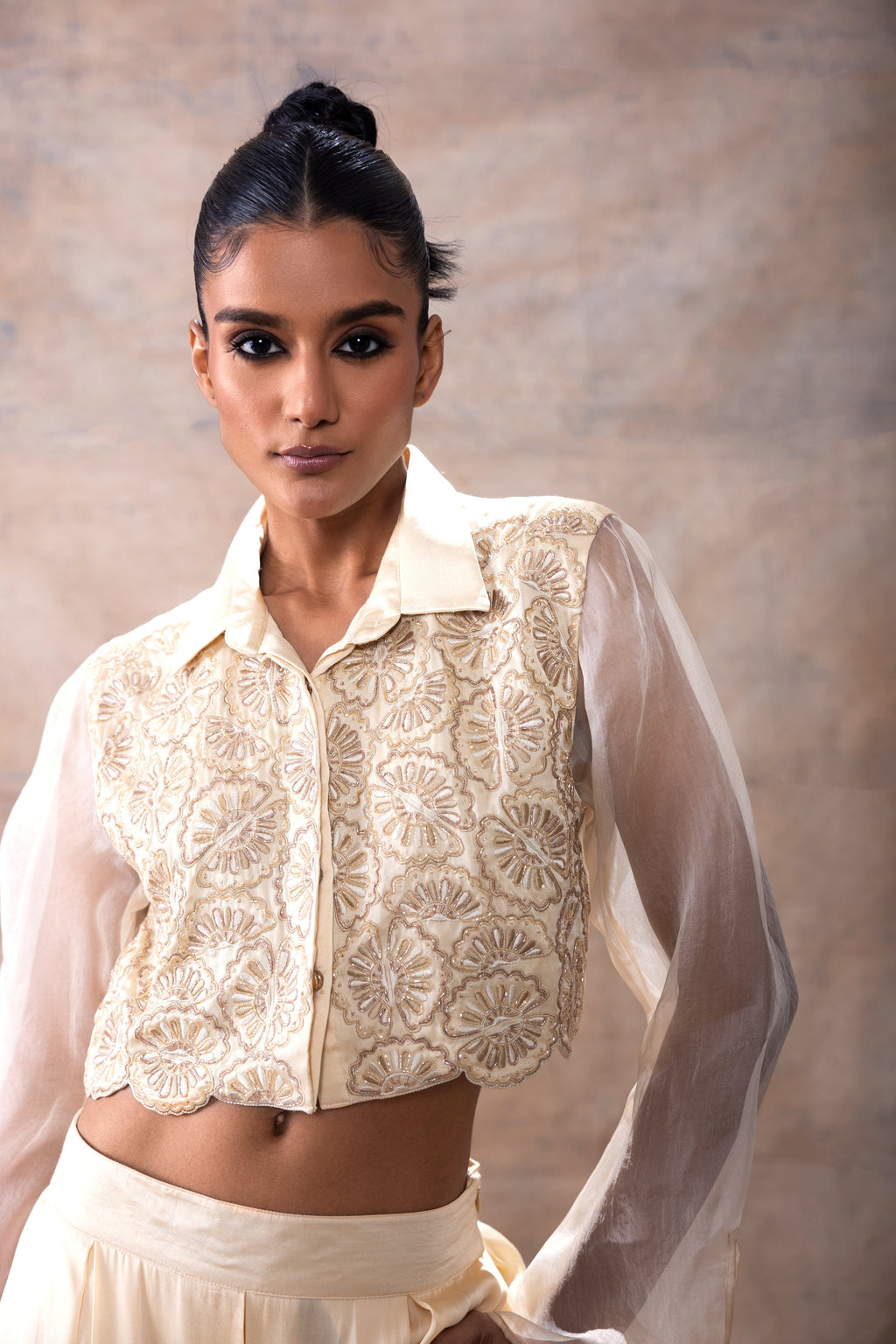 Emboridered Crop Shirt with Flared Pant Set at Kamakhyaa by Akashi Clothing. This item is Co-ord Sets, Evening Wear, Festive Wear, Hand Embroidered, missing, Modal Satin, Off-white, Organza, Party Wear, Party Wear Co-ord Sets, Relaxed Fit, White, Womenswear, Zaira by Akashi Clothing