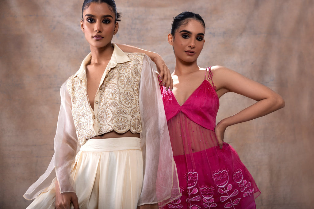Emboridered Crop Shirt with Flared Pant Set at Kamakhyaa by Akashi Clothing. This item is Co-ord Sets, Evening Wear, Festive Wear, Hand Embroidered, missing, Modal Satin, Off-white, Organza, Party Wear, Party Wear Co-ord Sets, Relaxed Fit, White, Womenswear, Zaira by Akashi Clothing