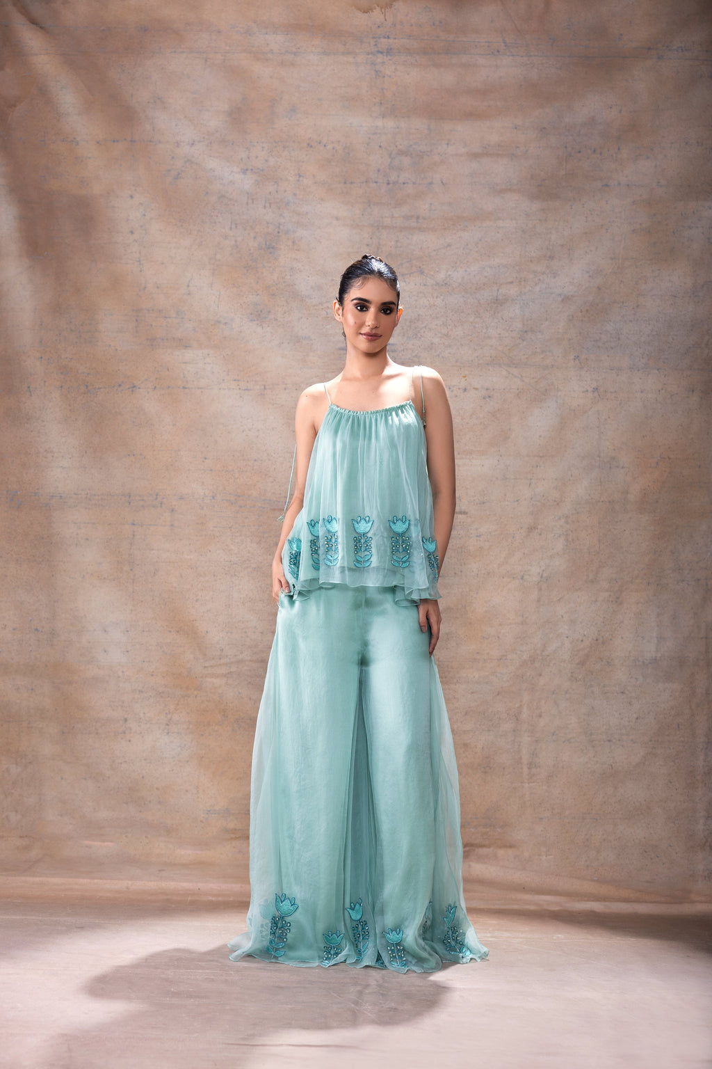 Flared Tunic Pant Set at Kamakhyaa by Akashi Clothing. This item is Blue, Co-ord Sets, Complete Sets, Festive Wear, Hand Embroidered, Kurta Pant Sets, Loose Fit, missing, Modal Satin, Organza, Party Wear, Teal Blue, Wedding Wear, Womenswear, Zaira by Akashi Clothing