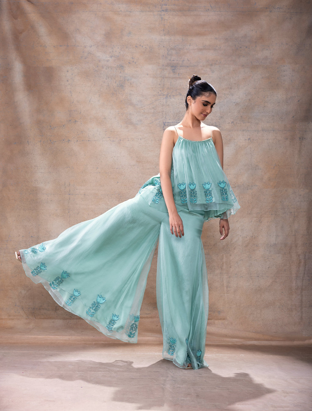 Flared Tunic Pant Set at Kamakhyaa by Akashi Clothing. This item is Blue, Co-ord Sets, Complete Sets, Festive Wear, Hand Embroidered, Kurta Pant Sets, Loose Fit, missing, Modal Satin, Organza, Party Wear, Teal Blue, Wedding Wear, Womenswear, Zaira by Akashi Clothing