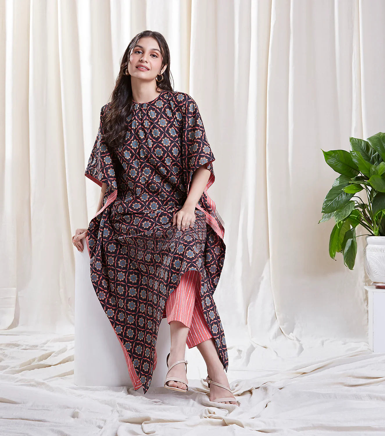 Floral Printed Black Kaftan Set at Kamakhyaa by Hasttvam. This item is Black, Cotton, Floral, Fusion Wear, Handmade by Artisans, Natural dyes, Relaxed Fit, Respondible production and Vegan