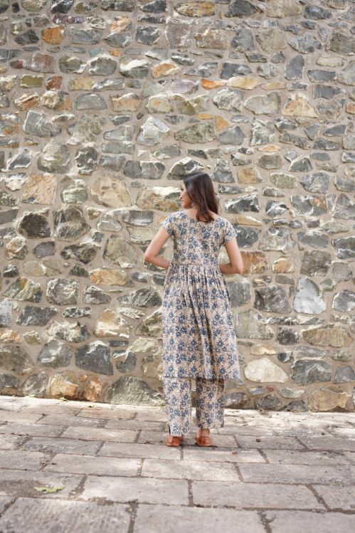 Floral Printed Kurta with pants at Kamakhyaa by Hasttvam. This item is Cotton, Floral, Fusion Wear, Handmade by Artisans, Natural dyes, Relaxed Fit, Respondible production and Vegan, White