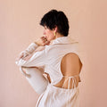 Floret Flicker at Kamakhyaa by The Loom Art. This item is Eco friendly, Fluer De Code by The Loom Art, Hand Embroidered, Ivory, Linen, Organic, Shirt Dresses