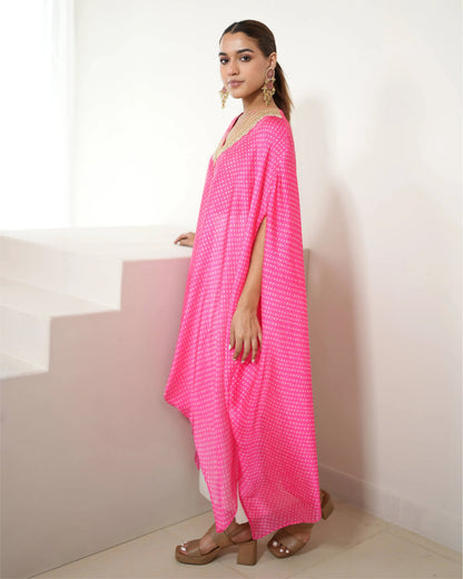 Fuchsia Pink V-neck Kurta Pant Set at Kamakhyaa by Mayura Kumar. This item is Bandhej, Bandhej Bandhini Mixology by Mayura Kumar, Chhath Puja, Dry clean, Festive Wear, Pink, Relaxed Fit, Satin Silk, Tie-Dye