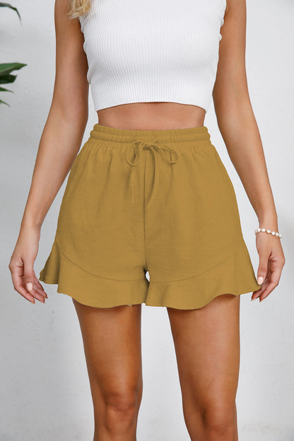 Full Size Drawstring Ruffle Hem Shorts at Kamakhyaa by Trendsi. This item is GZXK, Ship From Overseas, Trendsi