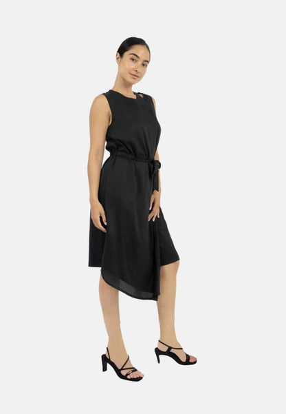 Funchal Asymmetric Wrap Dress Black at Kamakhyaa by 1 People. This item is Made from Natural Materials