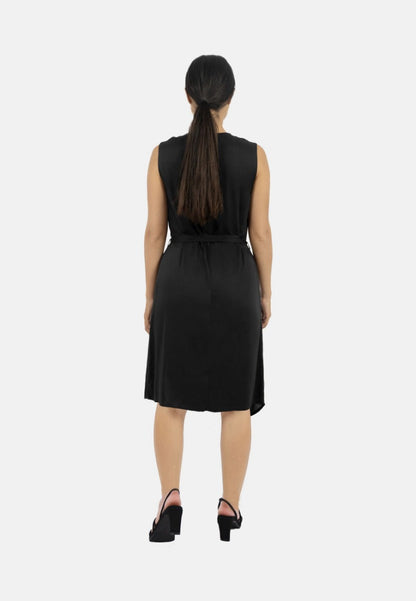 Funchal Asymmetric Wrap Dress Black at Kamakhyaa by 1 People. This item is Made from Natural Materials