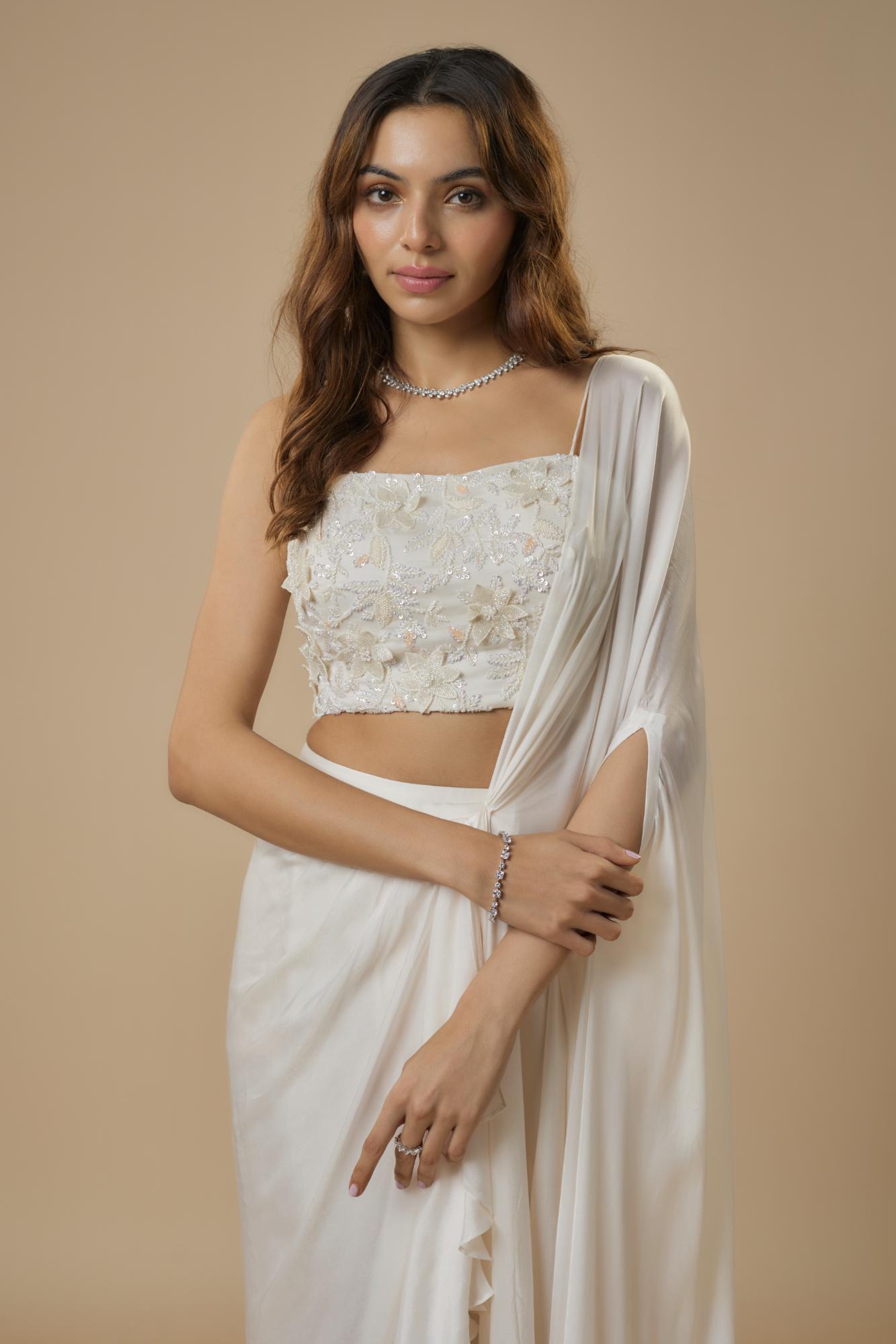 Georgette Ivory Drape Saree at Kamakhyaa by Ewoke. This item is destination wedding lehengas, embroidered lehengas, Georgette, Lehenga set, Nostalgia's Thread by Ewoke, Under $50
