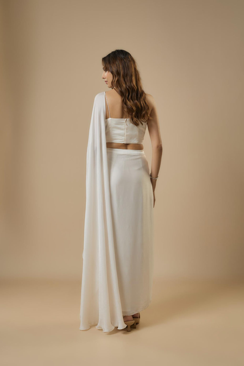 Georgette Ivory Drape Saree at Kamakhyaa by Ewoke. This item is destination wedding lehengas, embroidered lehengas, Georgette, Lehenga set, Nostalgia's Thread by Ewoke, Under $50