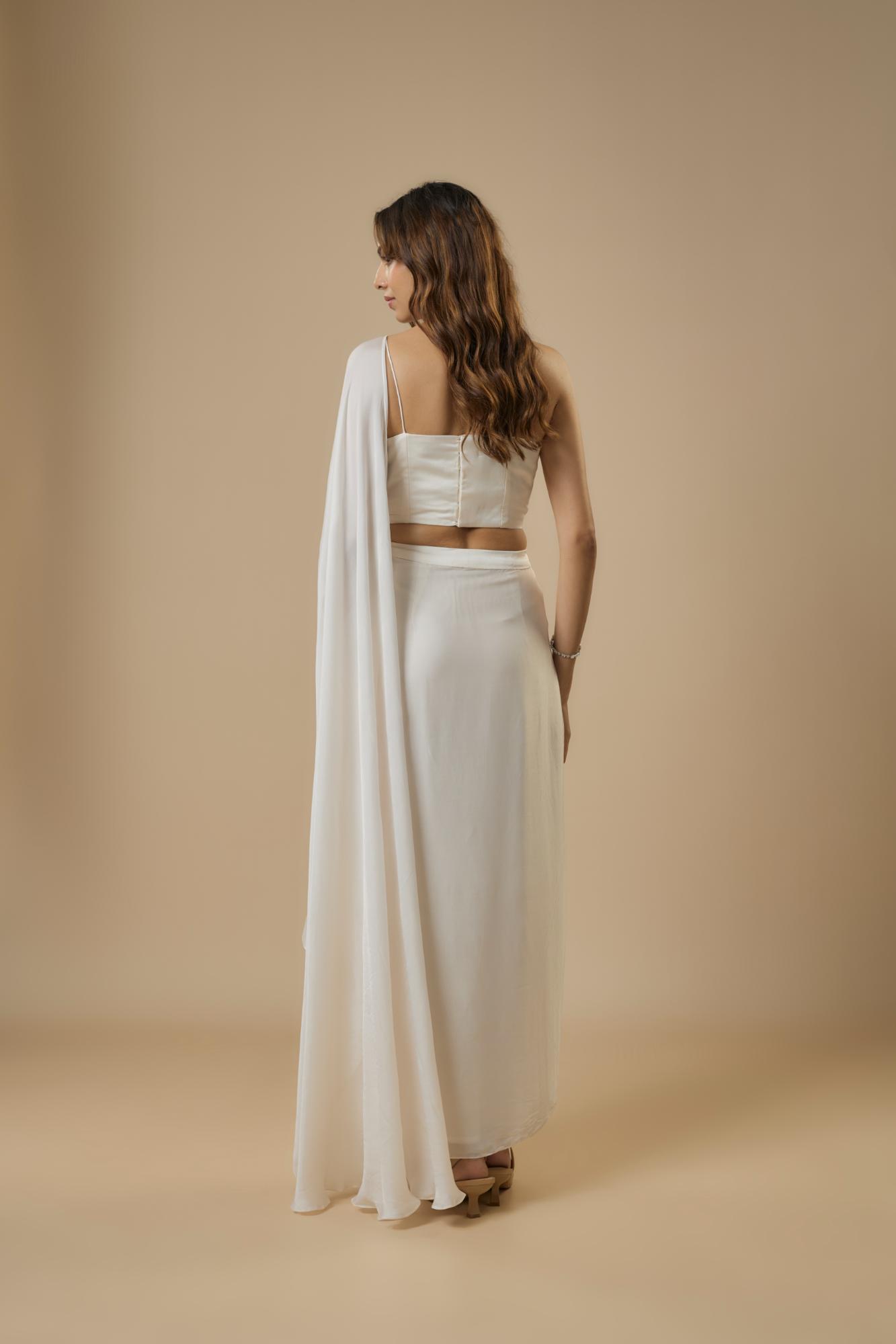 Georgette Ivory Drape Saree at Kamakhyaa by Ewoke. This item is destination wedding lehengas, embroidered lehengas, Georgette, Lehenga set, Nostalgia's Thread by Ewoke, Under $50