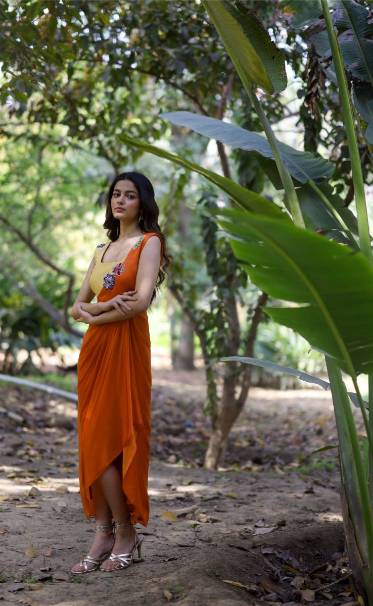Georgette Orange & Yellow Draped Dress at Kamakhyaa by Ewoke. This item is ewoke dresses, Floral, Georgette, Nostalgia's Thread by Ewoke, Orange, Wedding wear, womenswear dresses